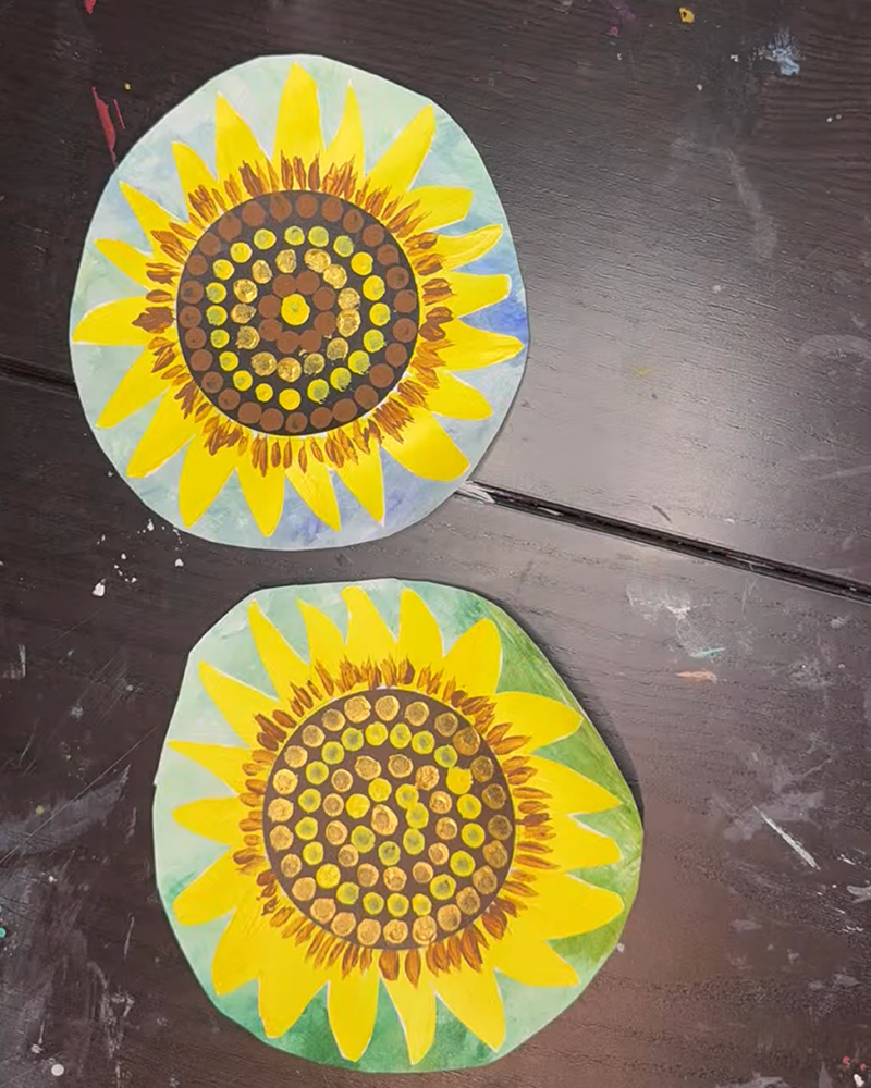Finished colorful mixed-media sunflower art for kids.