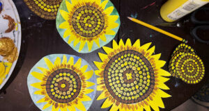 Colorful mixed-media sunflower art project for kids from Fusion Muse.